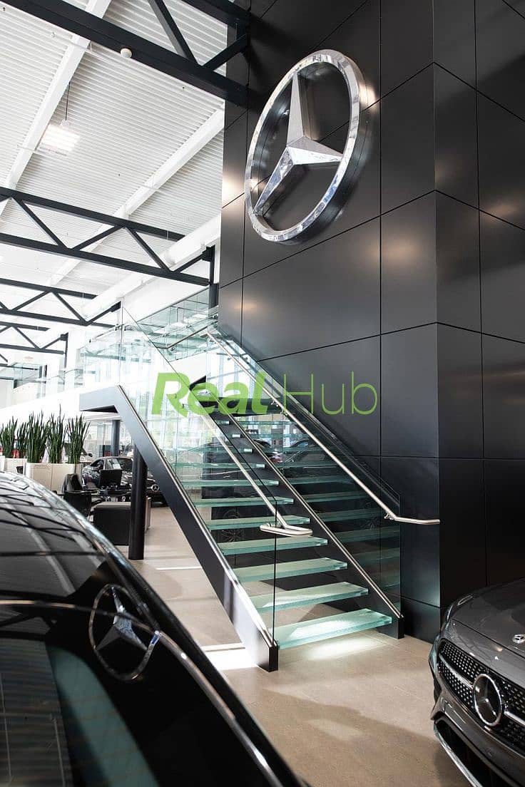 12 Commercial Glass Staircase _ Mercedes Dealership Project. jpg