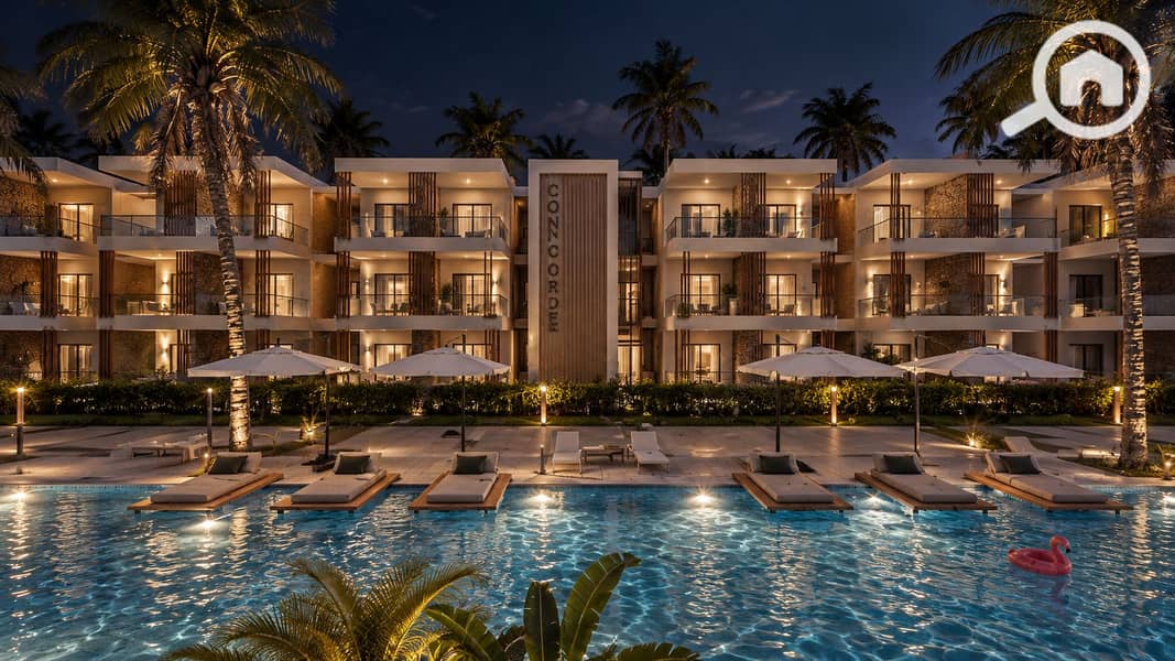 2 Concorde Resort Pool at Night. png