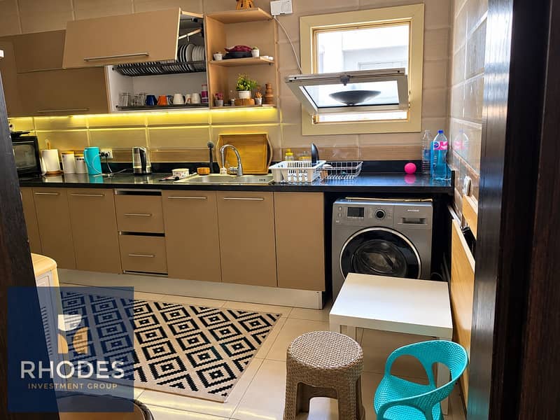 2 Bright Modern Kitchen-Laundry Interior. png