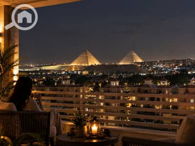 فلیٹ 2 غرفة نوم للبيع في 6 اكتوبر، الجيزة - Cozy Balcony Overlooking the Illuminated Pyramids. png فلیٹ 2 غرفة نوم للبيع في 6 اكتوبر، الجيزة - Cozy Balcony Overlooking the Illuminated Pyramids. png