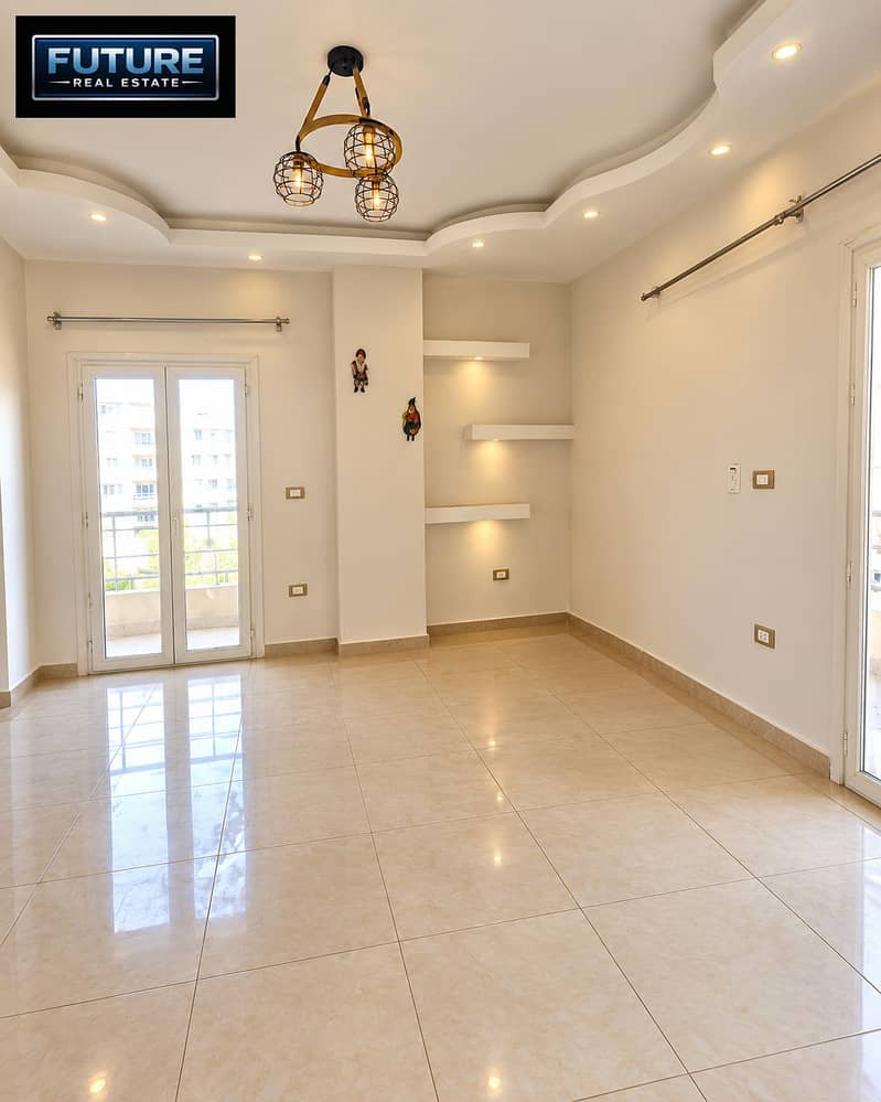 8 Bright Modern Room with Chandelier and Shelves. png