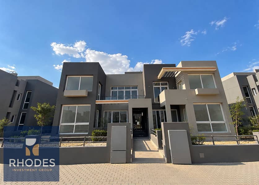 10 Modern Gray Townhouse Under Blue Skies. png