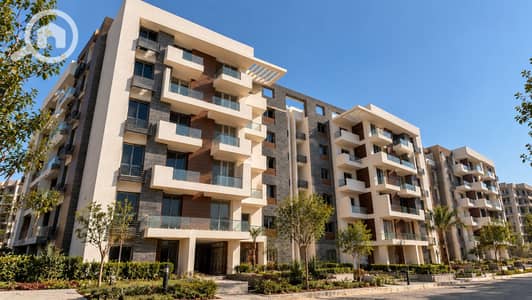 شقة 3 غرف نوم للبيع في مدينة المستقبل، القاهرة - Modern Apartment Complex with Lush Landscaping. png