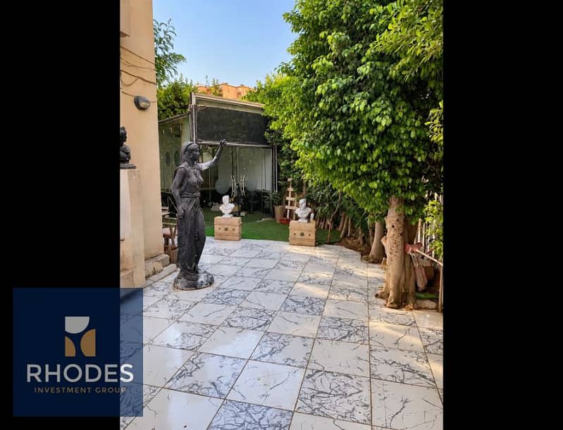 11 Sunlit Courtyard with Classical Statues. png