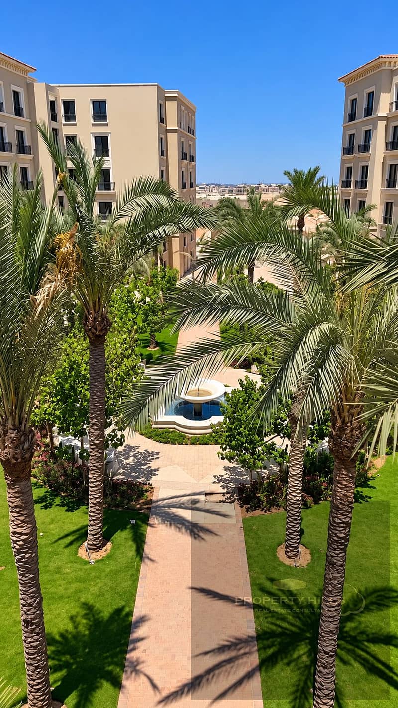 17 Sunlit Palm Courtyard with Fountain. png