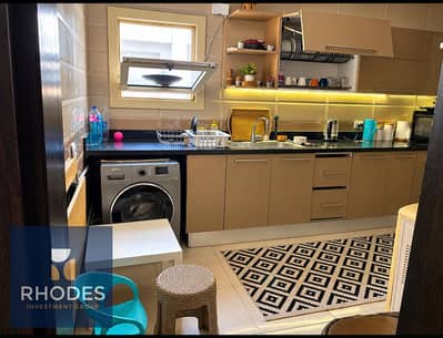 فلیٹ 3 غرف نوم للبيع في الشيخ زايد، الجيزة - Bright Modern Kitchen-Laundry Interior. jpg