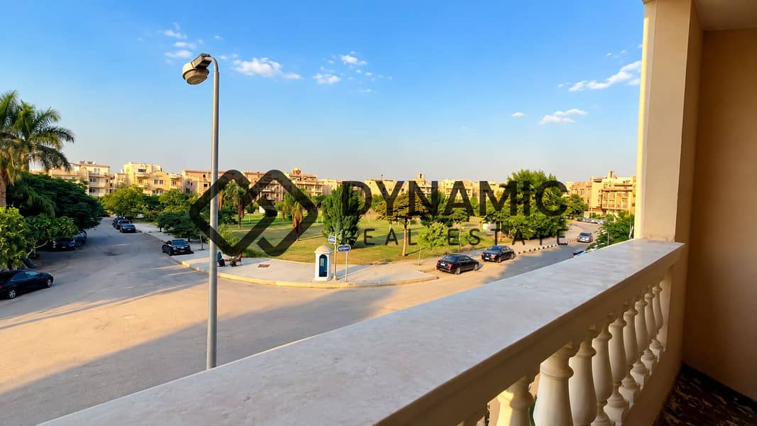 4 Sunlit Balcony Overlooking a Green Residential Park. png
