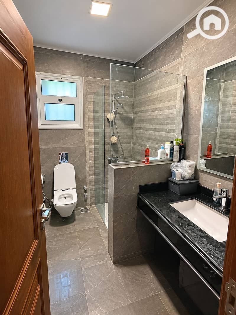 12 Modern Gray Marble Bathroom with Shower and Vanity. png