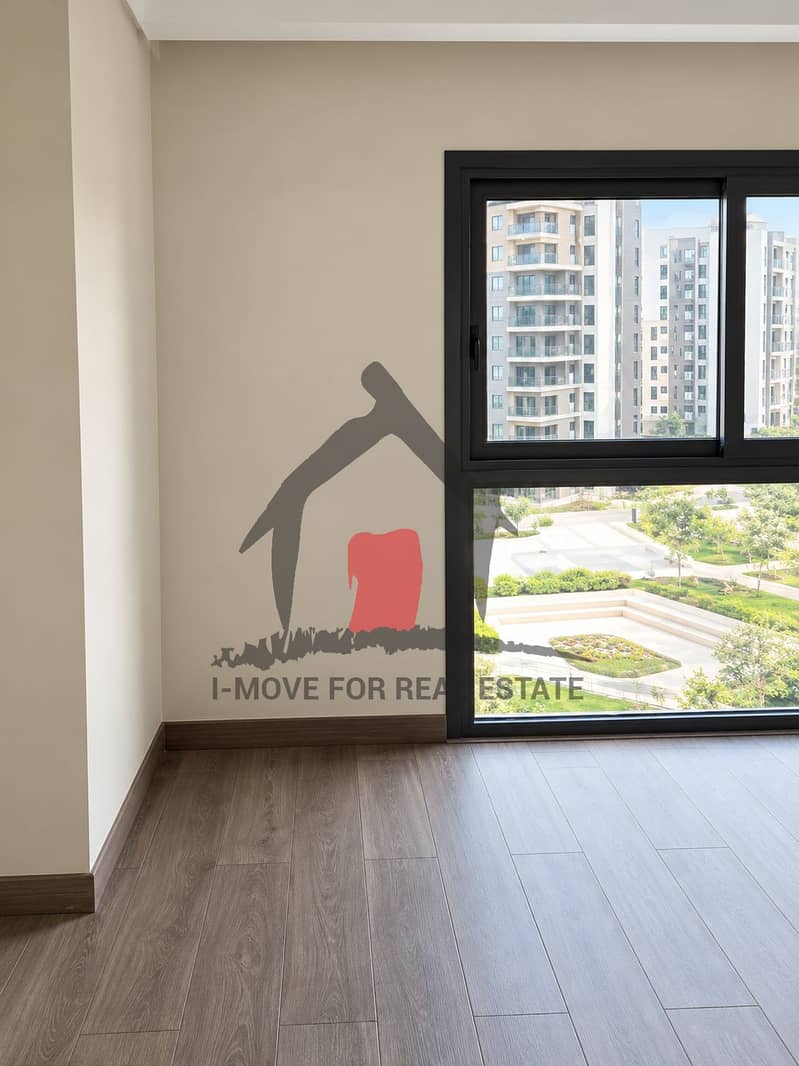 5 Minimalist Apartment Interior with Courtyard View. png