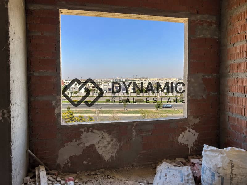 4 Unfinished Room Framing a Sunny Cityscape. png