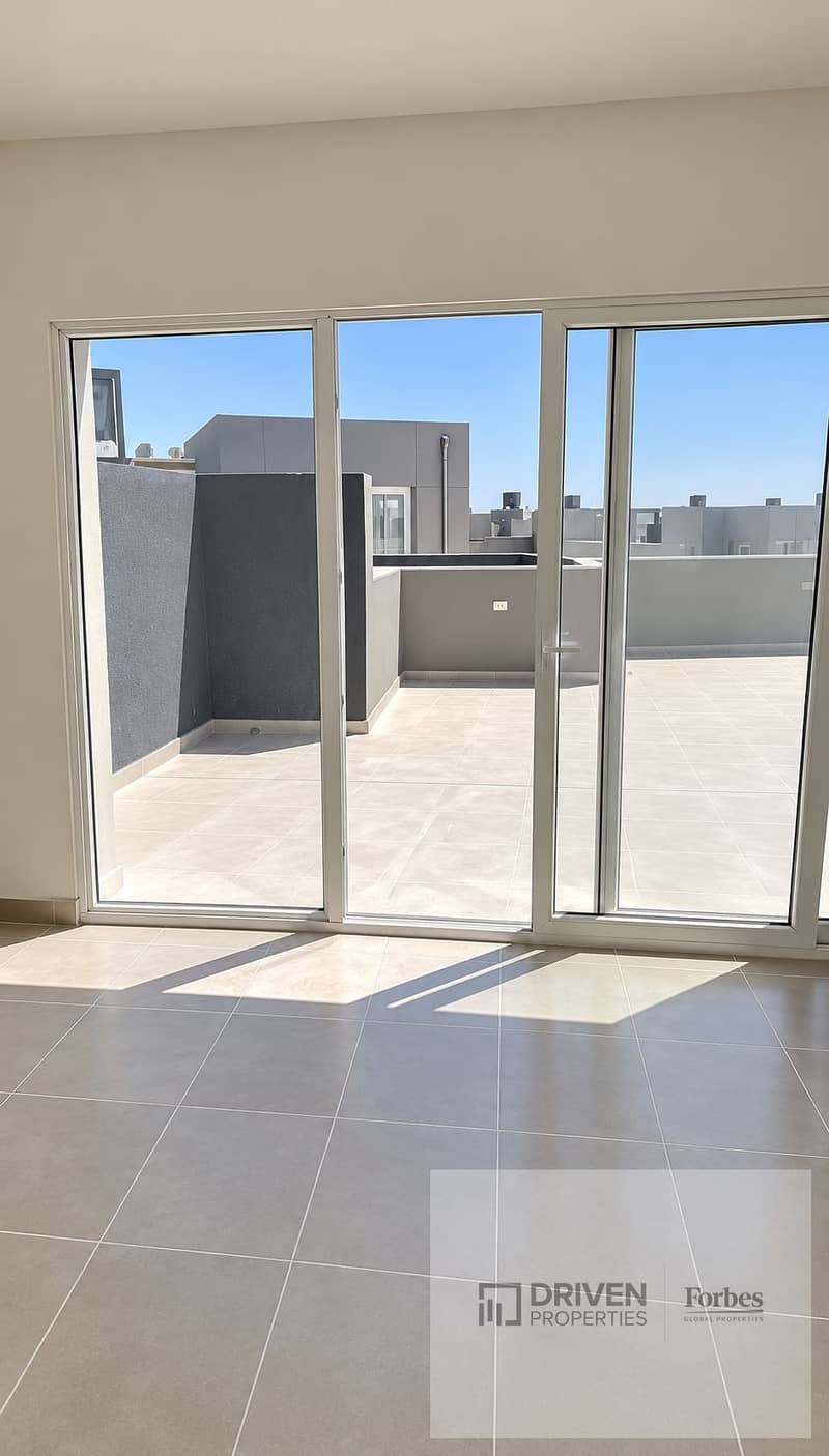 2 Sunlit Minimalist Room with Terrace Views. png