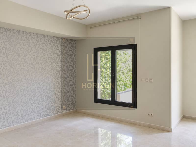 3 Empty Modern Room with Wallpaper and Chandelier. png