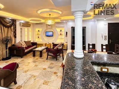 3 Bedroom Apartment for Sale in Madinaty, Cairo - غرفة معيشة فاخرة بإضاءة دافئة. png