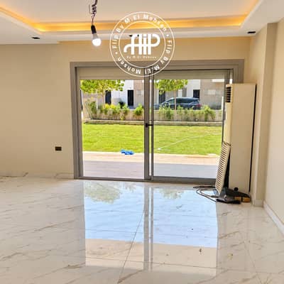 3 Bedroom Flat for Rent in 6th of October, Giza - Modern Living Room with Garden Views. png
