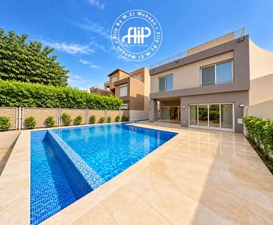 5 Bedroom Villa for Sale in 6th of October, Giza - Modern Villa with Blue Pool. png