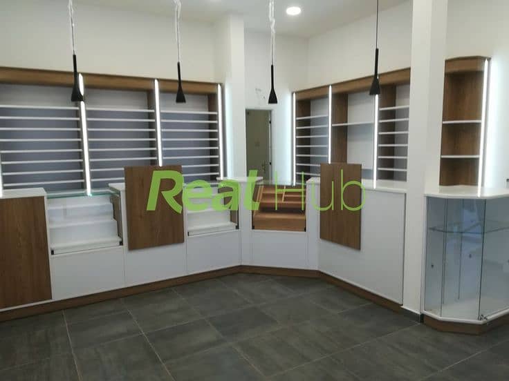 4 Mobiliario comercial - Estanco Villajoyosa - Mobiliario de madera. jpeg
