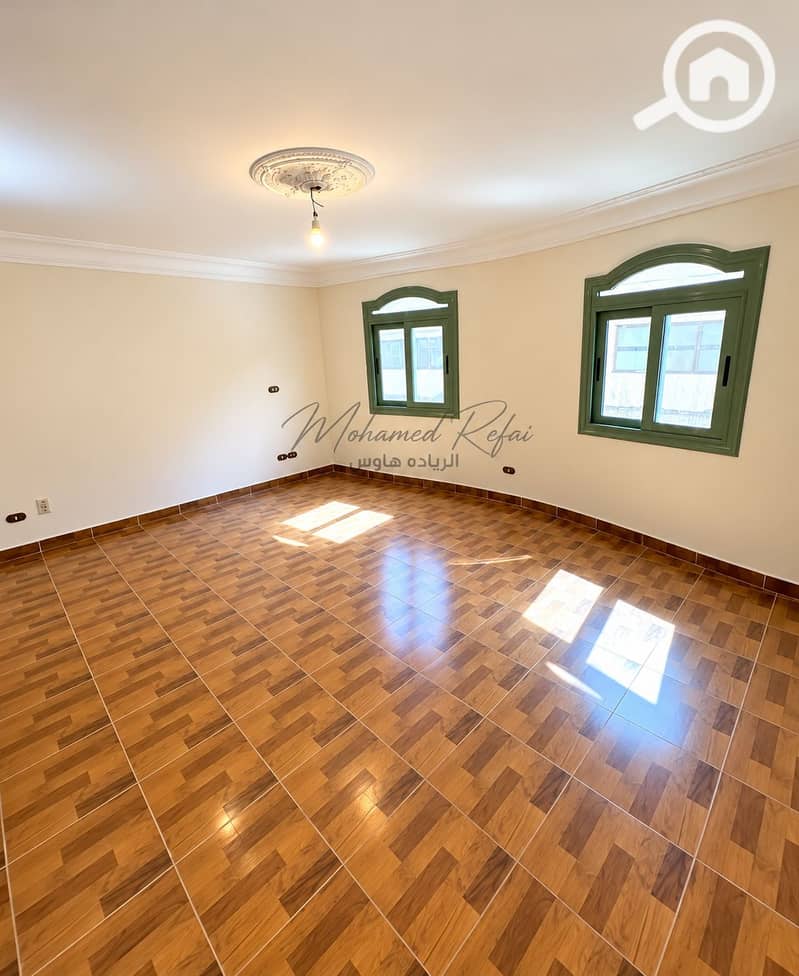 4 Bright Empty Room with Arched Windows. png