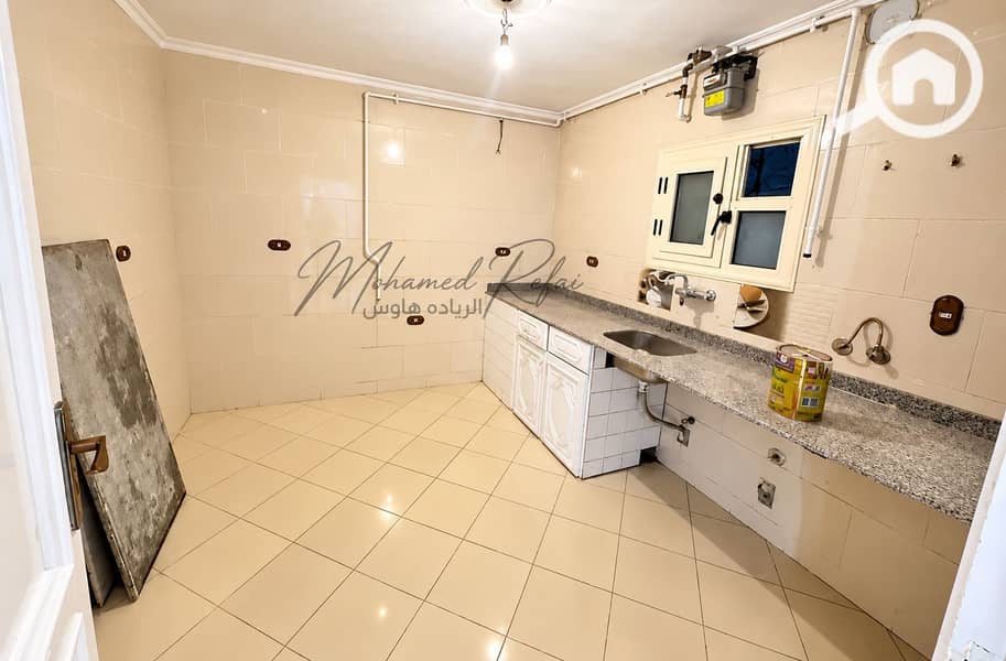 9 Bright Tiled Kitchen with Utility Plumbing. png